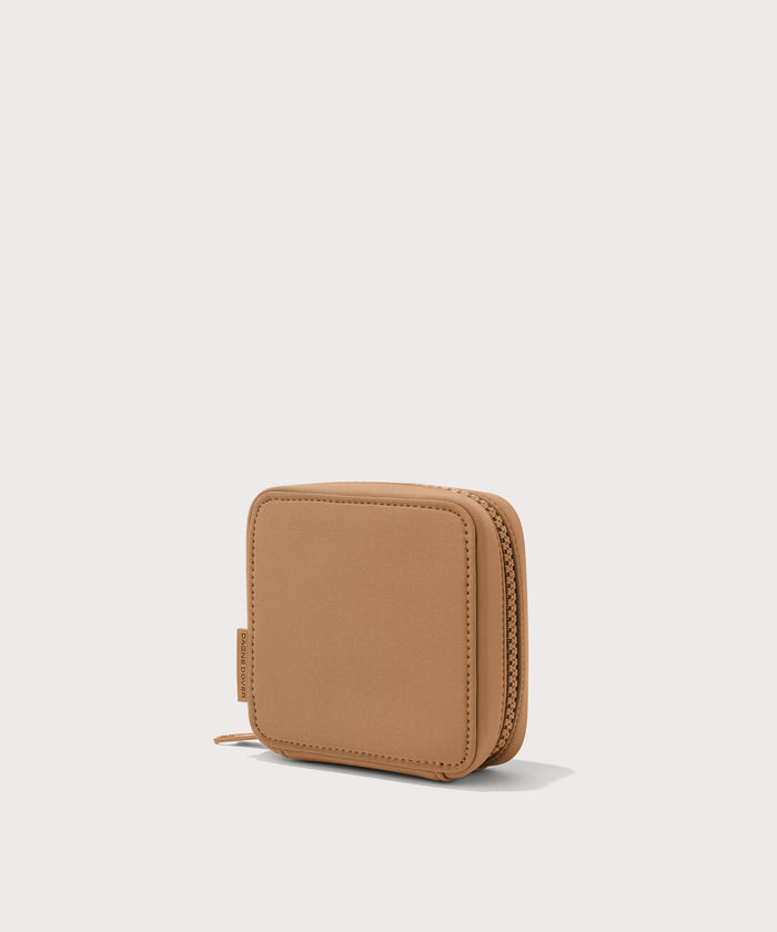 Dagne Dover small Arlo Tech Organizer in camel seen from an angle.