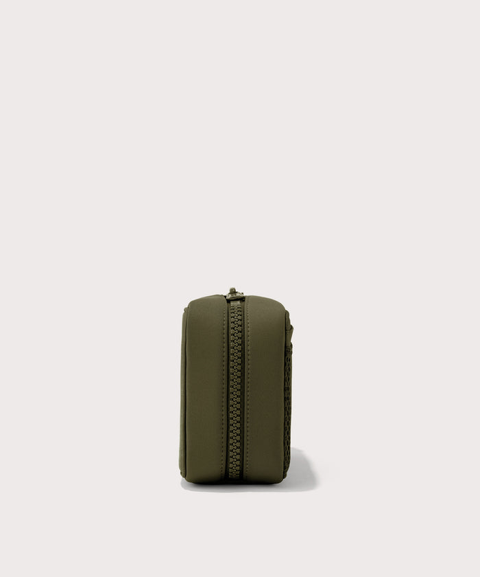 Dagne Dover large Arlo Tech Organizer in dark green seen from the side.