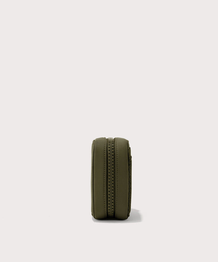 Dagne Dover small Arlo Tech Organizer in dark green seen from the side.