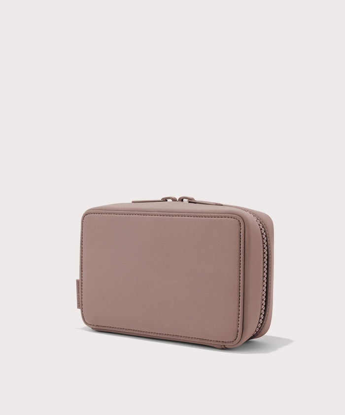 Dagne Dover large Arlo Tech Organizer in pink seen from an angle.