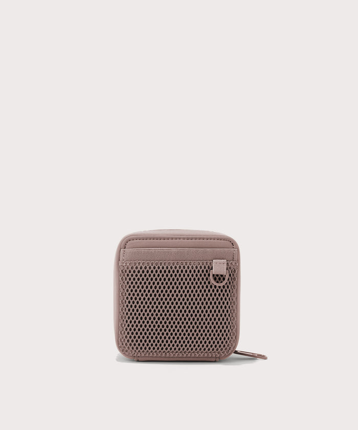 Dagne Dover small Arlo Tech Organizer in pink seen from the back.