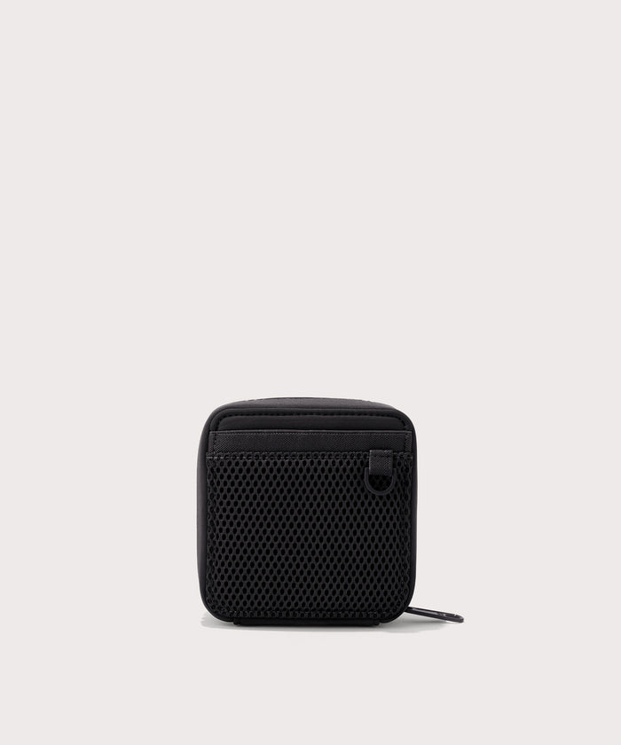 Dagne Dover small Arlo Tech Organizer in black seen from the back.