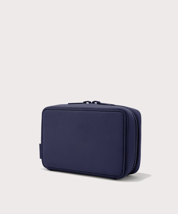 Dagne Dover large Arlo Tech Organizer in dark blue seen from an angle.