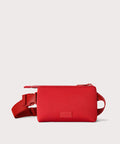 Dagne Dover Bennie Sling in a fiery, saturated red leaning toward orange.