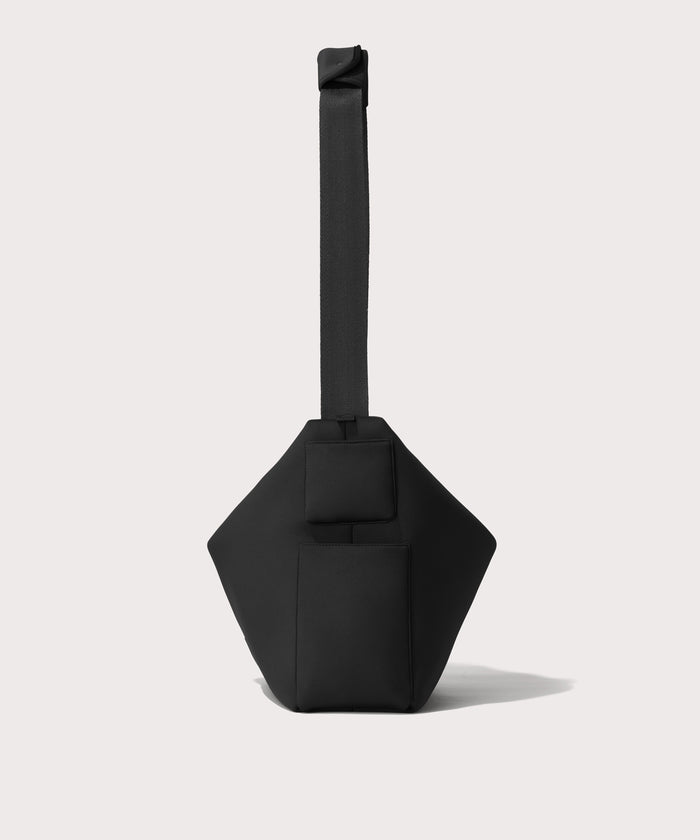 Large Shoulder bag in a black seen from the side view showing phone pocket.