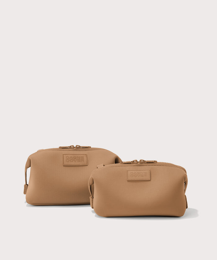 Dagne Dover Small and Large Hunter Toiletry Bags in camel brown.