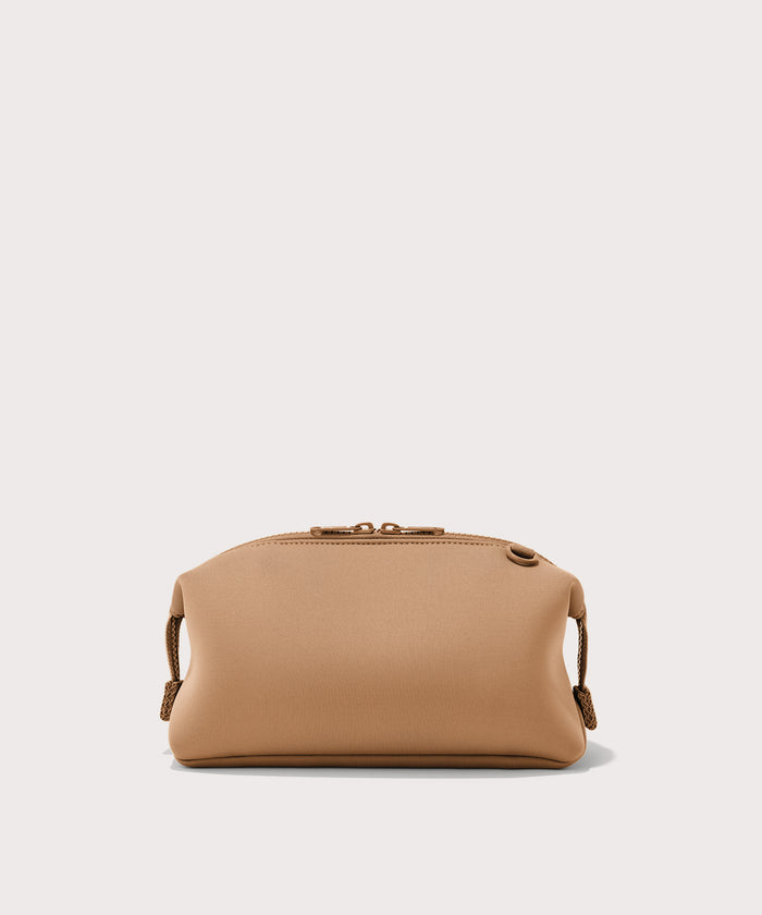 Dagne Dover Large Hunter Toiletry Bag in camel brown seen from the back.