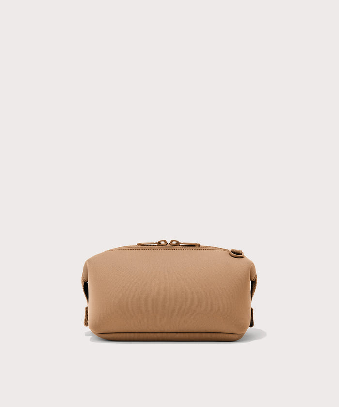 Dagne Dover Small Hunter Toiletry Bag in camel seen from the back.