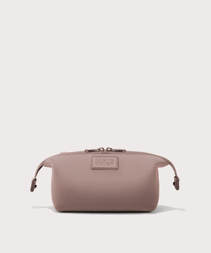 Dagne Dover Small Hunter Toiletry Bag in pink with sides unclipped.