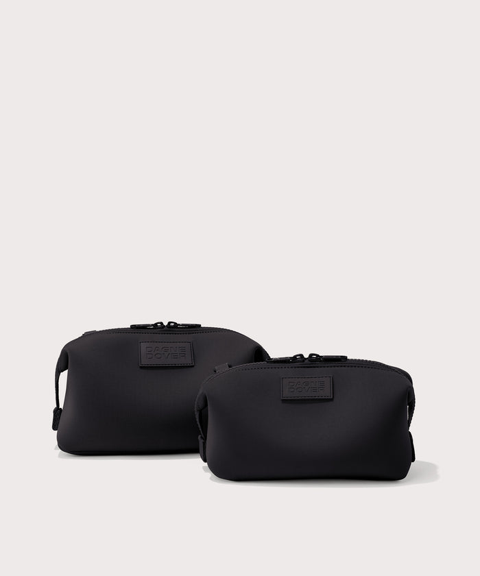 Dagne Dover Small and Large Hunter Toiletry Bags in black.