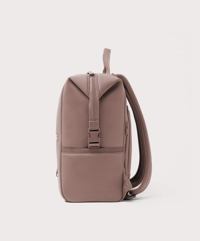 Dagne Dover Large Indi Diaper Backpack in pink seen from the side.