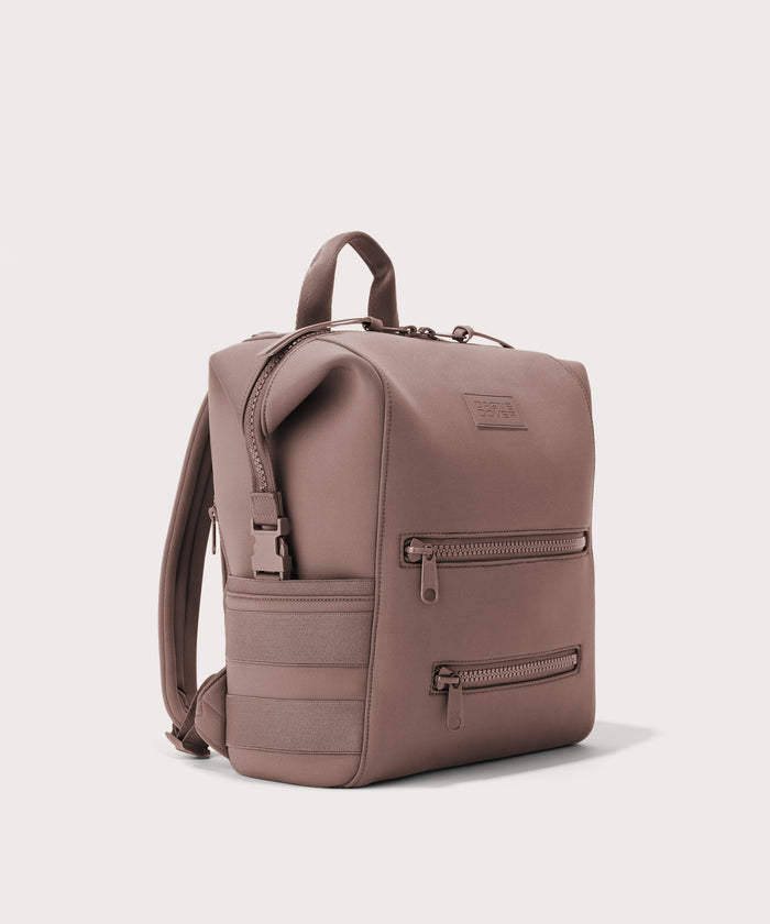 Dagne Dover medium Indi Diaper Backpack in pink seen from an angle.