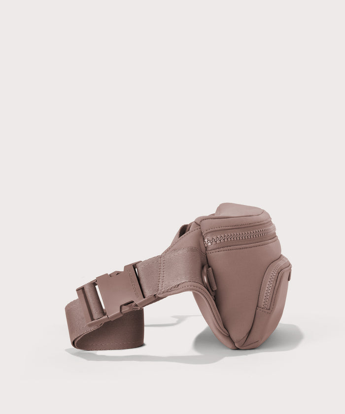 Dagne Dover jax large fanny pack in pink seen from an angle.