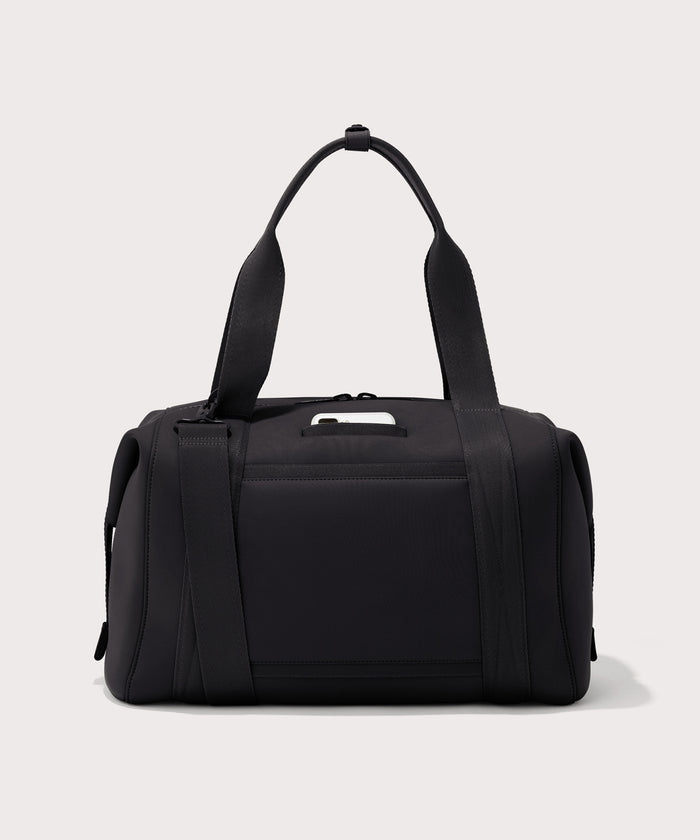 Large Landon Carryall in black, displaying an exterior phone pocket