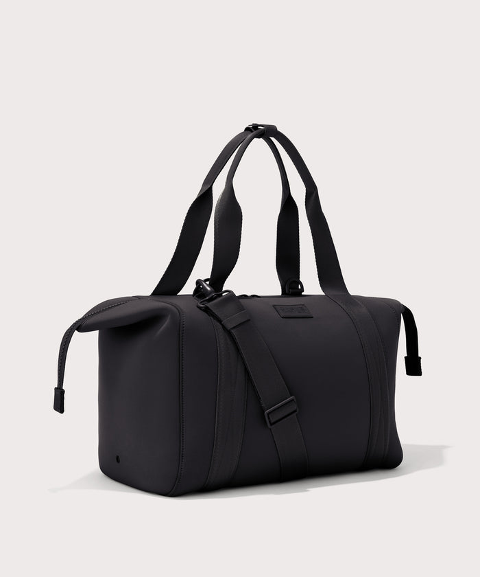 Large Landon Carryall in black with zippers unbuckled