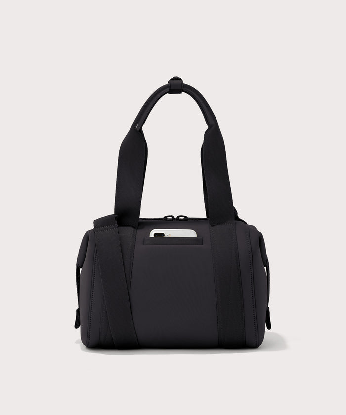 small Landon Carryall in black, displaying an exterior phone pocket