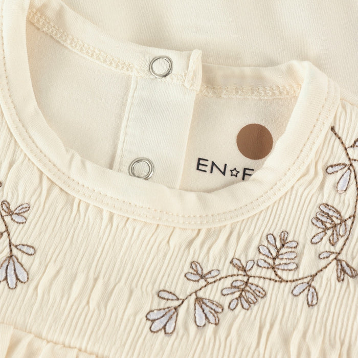Lavender Embroidery on Cream Bodysuit