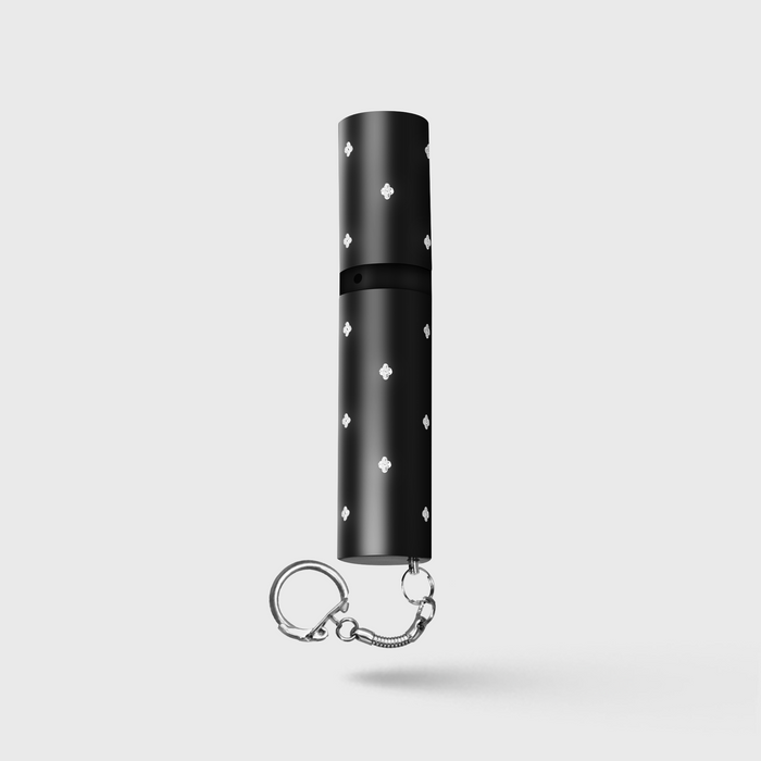 Lipstick-style stun gunstun gun with flashlight and keyring
