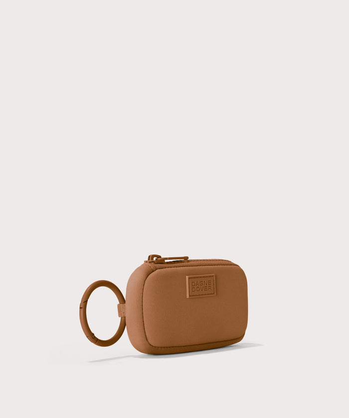 Mara Keychain in a saturated, warm medium-brown with burnt orange undertones.  side angle view