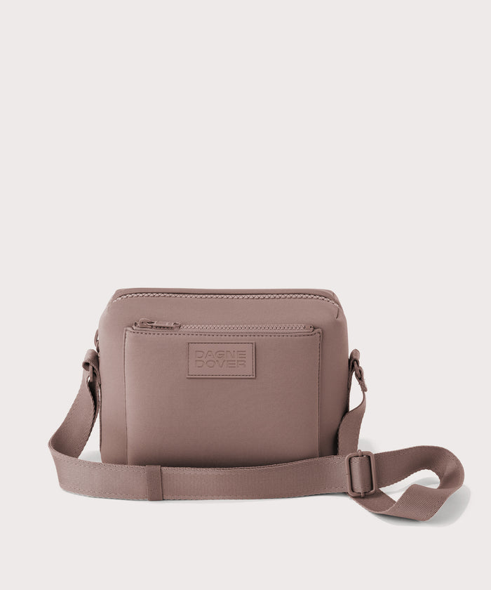 Dagne Dover Micah Crossbody in pink seen without the adjustable shoulder strap.