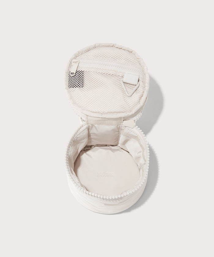 Dagne Dover small Mila Toiletry Pouch in white unzipped.