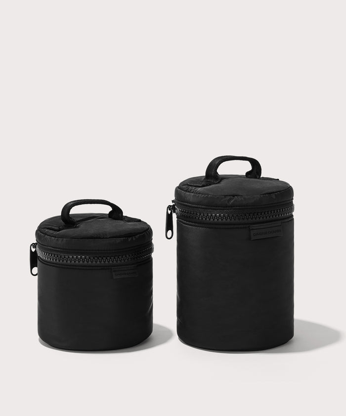 Dagne Dover small and large Mila Toiletry Pouches in black.