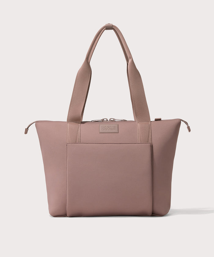 Tote  in a pink seen from the front view.