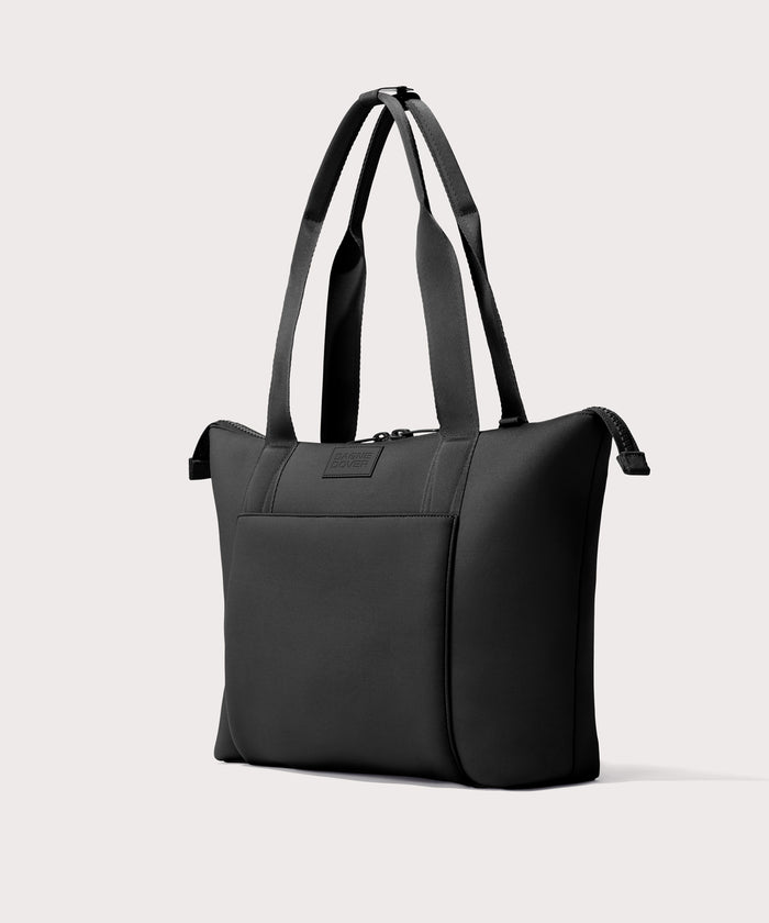 Tote  bag in a black seen from the angle view.