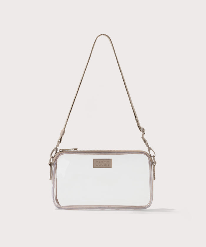 Clear crossbody bag with beige strap on a white background. Stadium compliant.