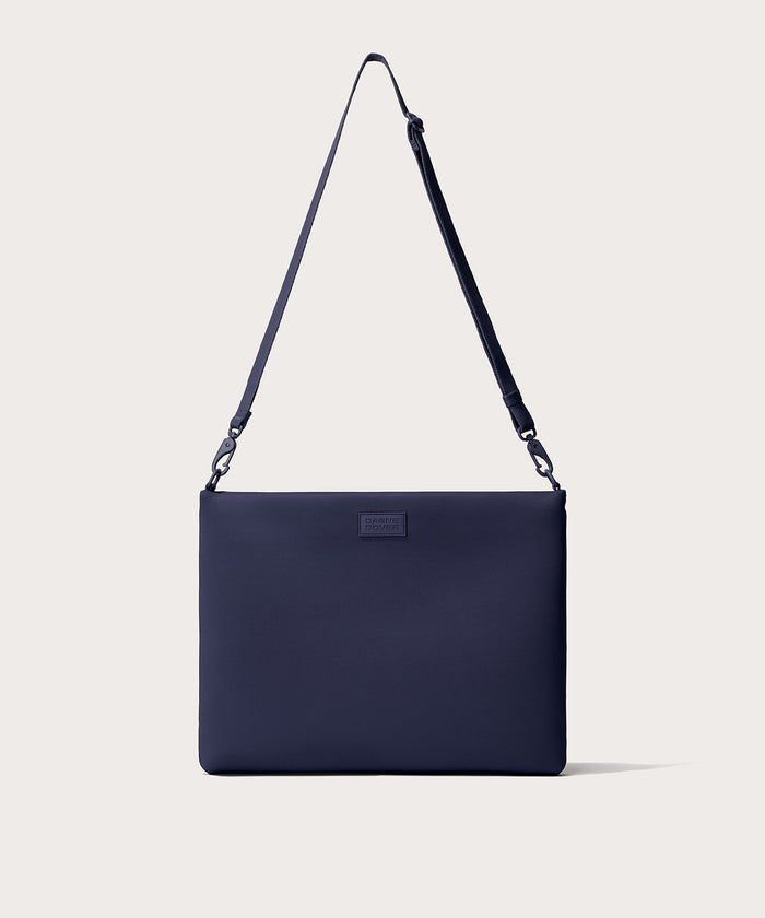 16 inch laptop shoulder bag in  navy blue seen from the front view.