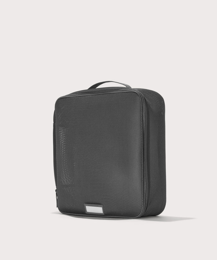 3/4 view of extra large Roma packing cube in carbon black