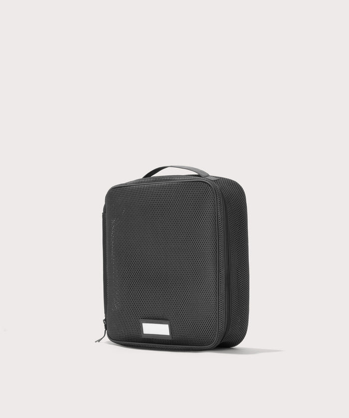 3/4 view of Large Roma packing cube in carbon black