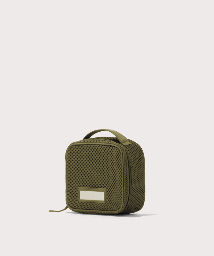 3/4 view of small Roma packing cube in dark green