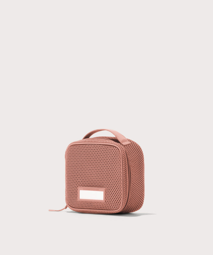 3/4 view of small Roma packing cube in warm dust pink