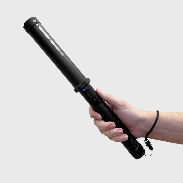 flashlight stun gun in hand with strap