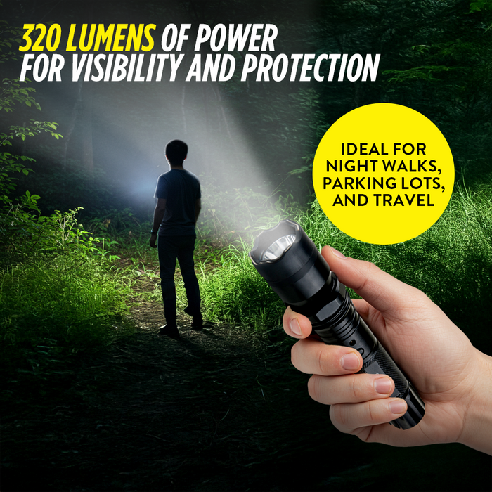 Hand holding a black tactical flashlight stun gun