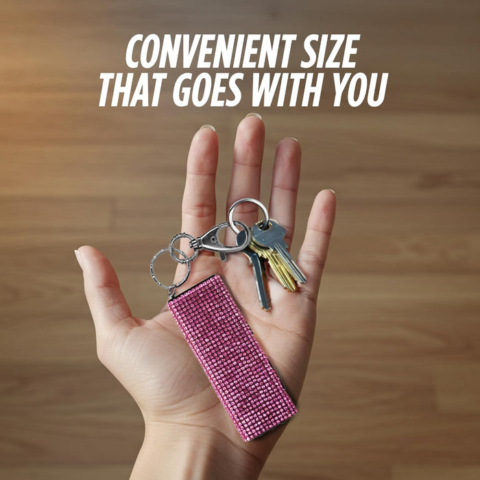 stun gun with rhinestones on keychain in hand