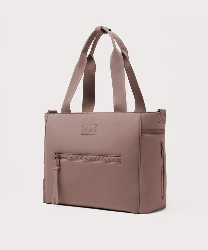 Dagne Dover large Wade Diaper Tote in pink seen from an angle.